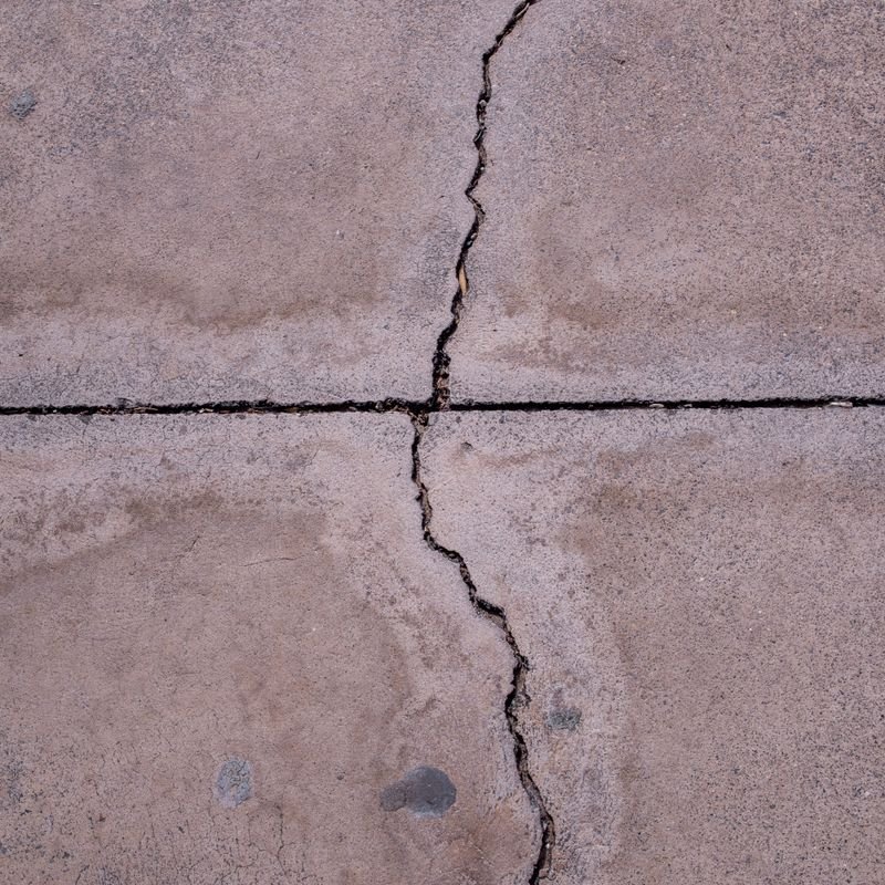 Structural crack in concrete foundation wall needing survey