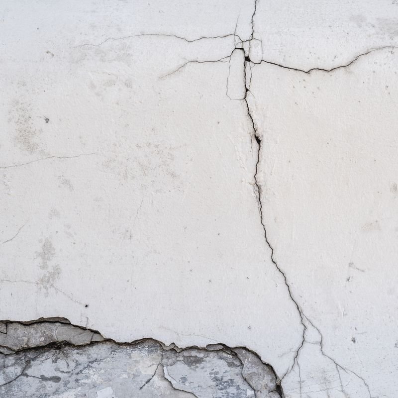 Plaster and wall cracking under inspection